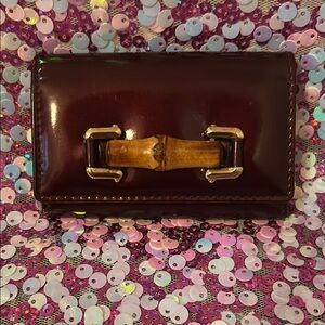 Elegant Gucci Burgundy key holder with Bamboo Accent